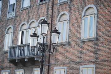 
Venetian building facade with lamppost in the foreground