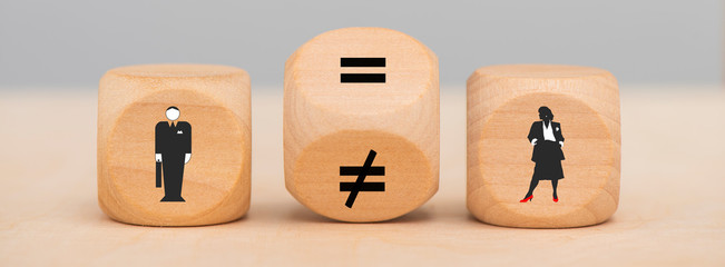 equality of man and woman printed on wooden cubes