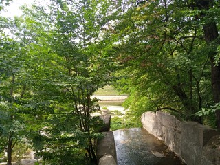 Summer landscape, waterfall in the park