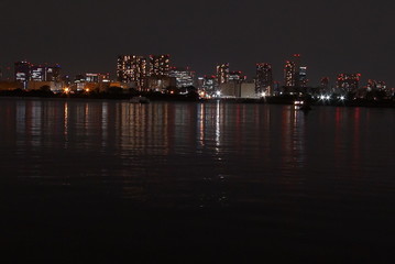 Fototapeta na wymiar Cityscape at night in Tokyo, Japan