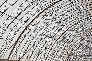 Arched Roof Device, Transparent Plastic and Load-Bearing Structural Elements