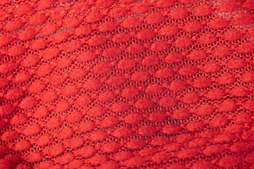 Red texture pattern background with relief. Textured surface
