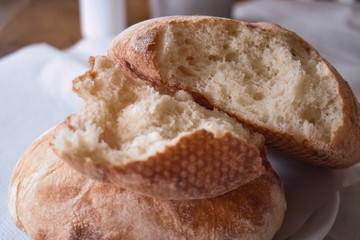 A loaf of traditional Serbian homemade bread - fresh lepinja (somun, pogaca)