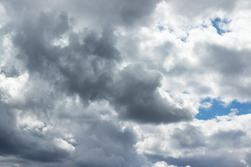Dramatic sky with gray white blue clouds. Overcast and cloudy to rain