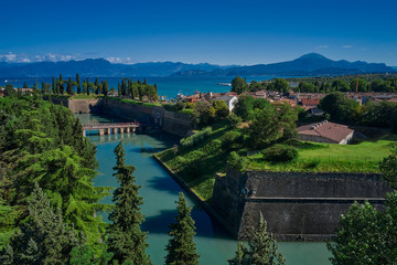 Beautiful view of the city of Peschiera del Garda, Italy. Coast of the largest in Italy Garda lake