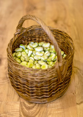 Fototapeta na wymiar wicker basket with beans, harvest time, cooking, summer