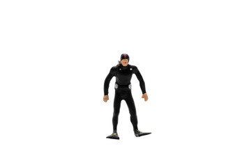 Miniature people : Scuba diver isolated on white background with clipping path