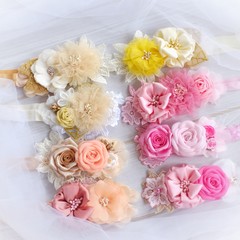 Handmade headband flower made out of flower fabric in beautiful pastel colors. The handmade floral is great for hair accessories with its colorful flower and beautiful for hair band.