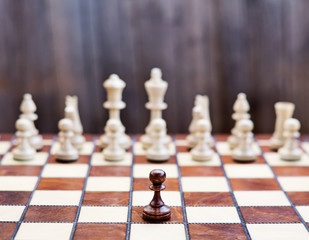 Chess on chessboard, concept image