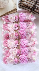 Headband flower with pastel color made out of flower fabric in beautiful pink shades. The handmade floral is great for hair accessories with its colorful flower and beautiful for hair band.