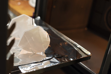 self cleaning of the mask by heat in a conventional oven