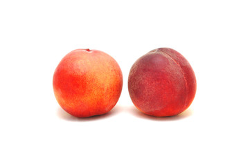 Ripe juicy peach on white background close up