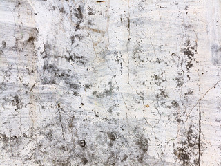 Cracks. Background surface with creative cracks. Web cracks as a background for creative design for a layout. Stone surface of the cement layer with a network of deep cracks. Anxious appearance