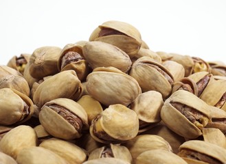 Pistachio Nuts, pistacia vera, Dry Fruits against White Background