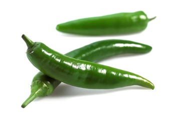 Green Chili Pepper, capsicum annuum against White Background