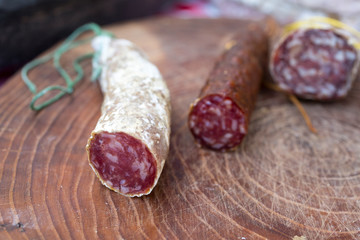 dry sausage on a wooden board
