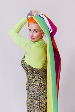 A sexy young lady with her rainbow flag.