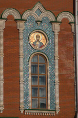 close up of blue mosaic tiles with icon on facade of the Annunciation of the Blessed Virgin Mary on the Brugges Embankment, Yoshkar-Ola, Russia