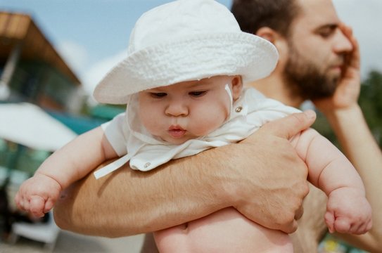 Father carring a baby
