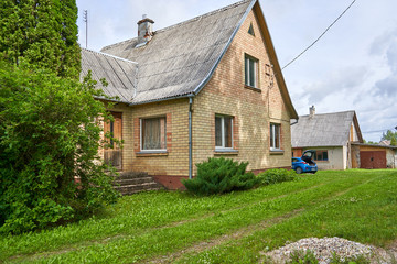 Fototapeta na wymiar Old red bricks house in the countryside 