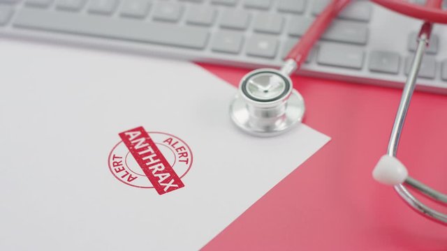ANTHRAX ALERT stamp on the paper, doctor's workplace
