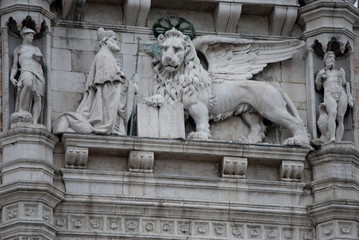 
winged lion symbol of Venice with paw resting on a book on which it is written in Latin: "peace to you, Marco, my evangelist"
