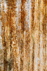 Creative bright metallic background. Flat background texture of dirty rusty metal. Bright rusty spots as the main background for a vintage scratched design