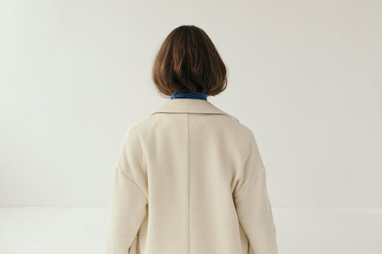 Anonymous model in coat
