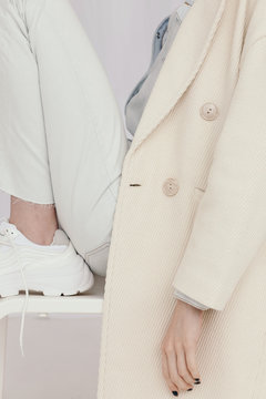 Crop woman in corduroy coat