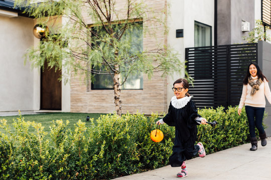 Mother Watches Daughter on Halloween