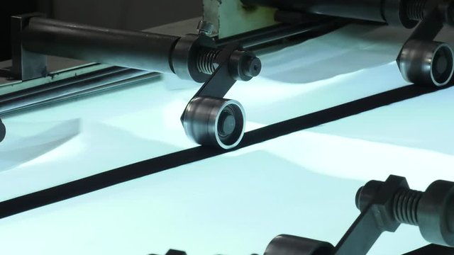 Production of white polypropylene flat yarn for the production of industrial bags. Stitching of the bottom of polypropylene bags.
