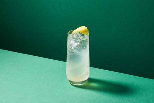 Glass of cool drink with lemon