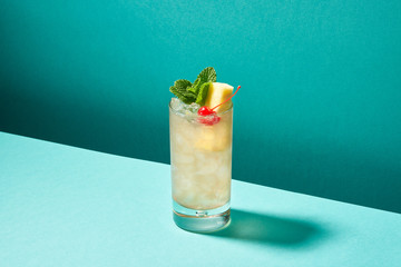 Appetizing frozen drink with cherry and mint