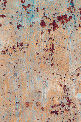 Creative bright metallic background. Flat background texture of dirty rusty metal. Bright rusty spots as the main background for a vintage scratched design