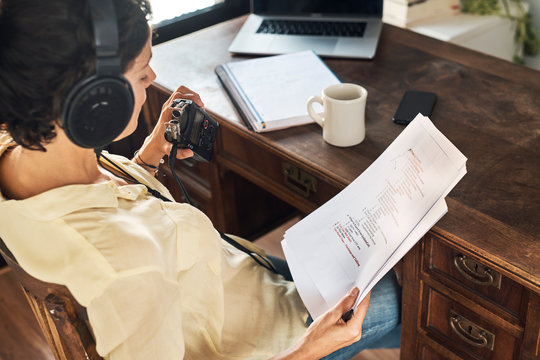 Woman recording podcast at home