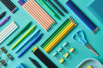Colorful various school supplies layout