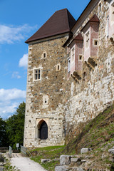 Fototapeta na wymiar The outer wall and watch tower on Ljubljana Castle / Ljubljanski grad, Ljubljana