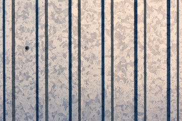 Creative striped metallic background. Flat background texture of dirty rusty metal. Bright rusty spots as the main background for a vintage scratched design