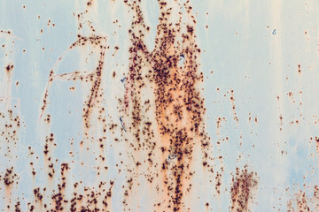 Creative bright metallic background. Flat background texture of dirty rusty metal. Bright rusty spots as the main background for a vintage scratched design