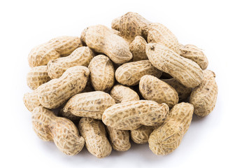 Close-up of delicious peanuts isolated on white background