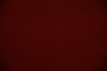 Perfect dark burgundy subdued textured background.