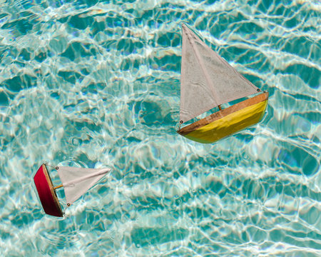 Wooden Toy Boats in Pool