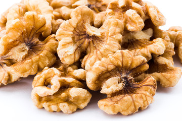 Close-up of delicious walnuts on the white background