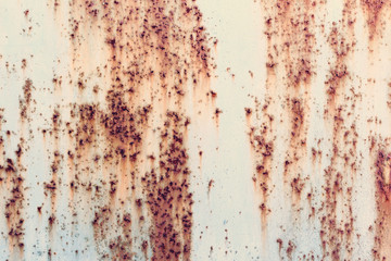 Creative bright metallic background. Flat background texture of dirty rusty metal. Bright rusty spots as the main background for a vintage scratched design