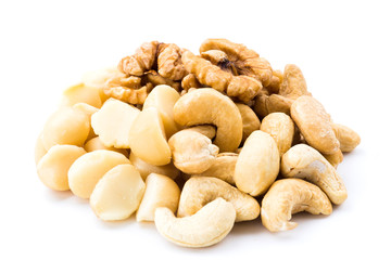 Variety of fresh nuts on the white background