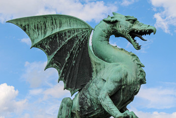 The Dragon statue at Dragon Bridge in old Medieval Ljubljana, Slovenia