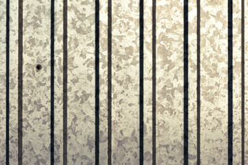 Creative striped metallic background. Flat background texture of dirty rusty metal. Bright rusty spots as the main background for vintage scratched design