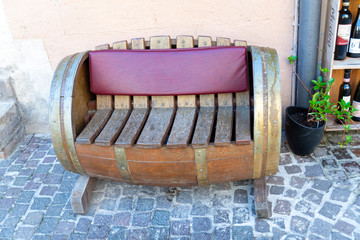 Wooden barrel for wine build by hand as a bench