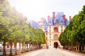 Fototapeta na wymiar Garden gates of French king royal Fontainebleau palace building, France