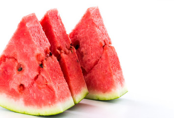Slice of watermelon isolated on bright background